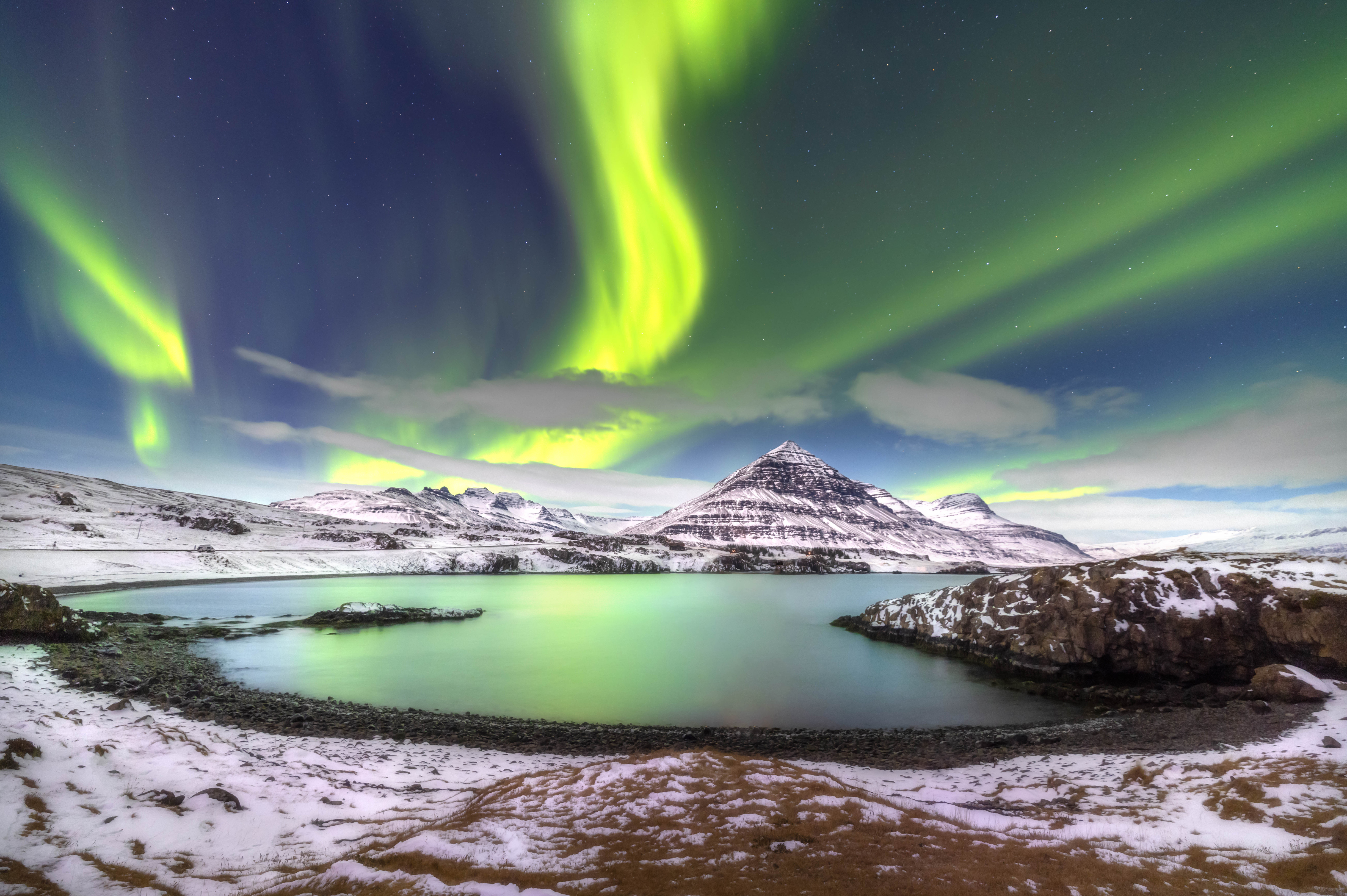 Image credit line: Aurora in the East Fjords, Jarrod Andrews. Aurora borealis over Búlandstindur mountain, East Fjords, Iceland. Canon EOS R5 camera with Samyang XP 14mm f/2.4 lens. A four second exposure at f/2.4 and ISO 1600.