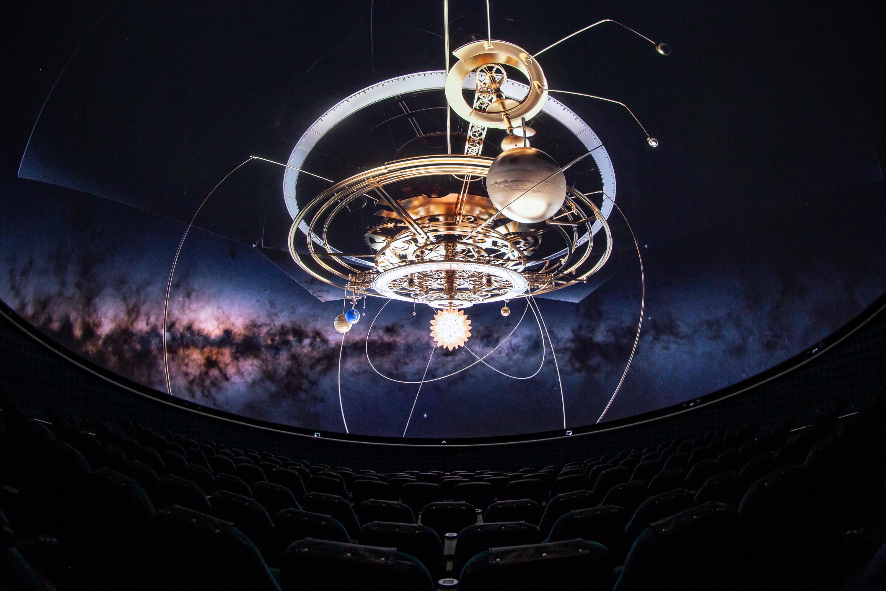 Full-dome image of the Dark Side of the Moon planetarium show, depicting an astrolabe