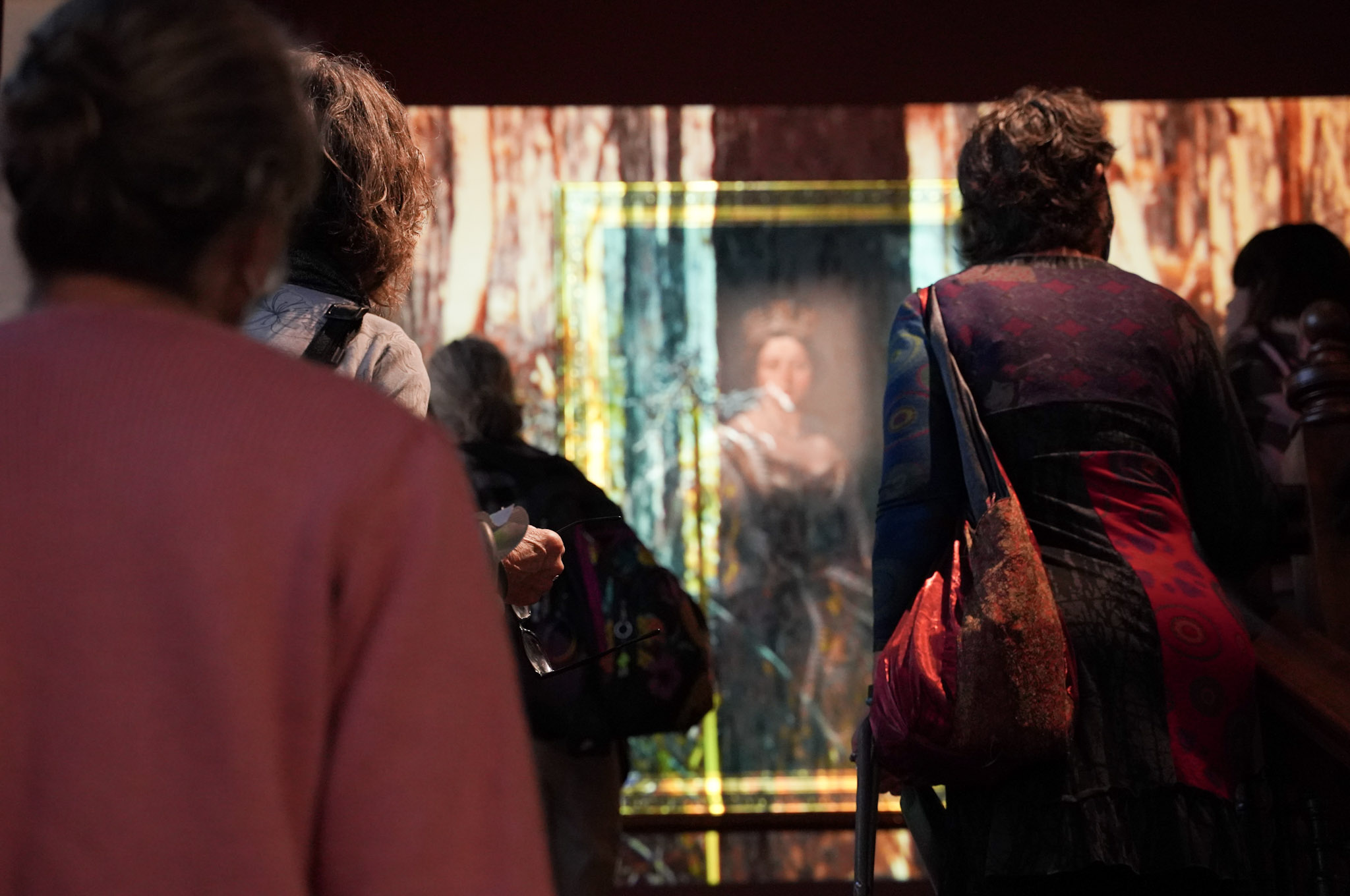 A group of ladies walking up the stairs at the Art Gallery at Royal Park