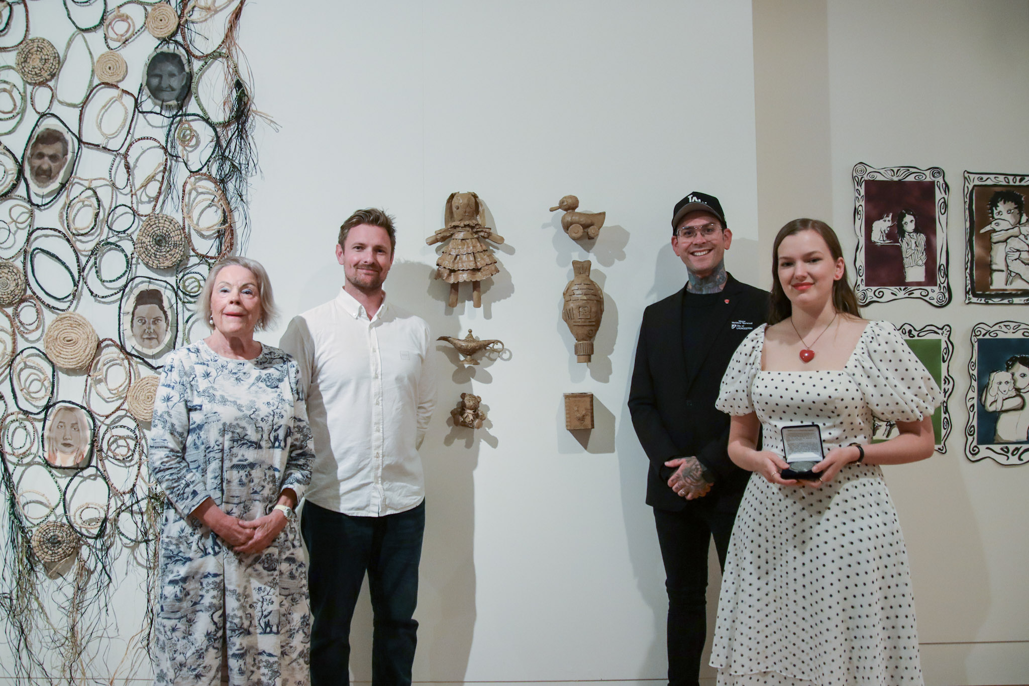 Susi Reid, Mayor Matthew Garwood, Hamish Hall and Severine Cherry pose for a photo at the presentation of the ArtRage Medallion.