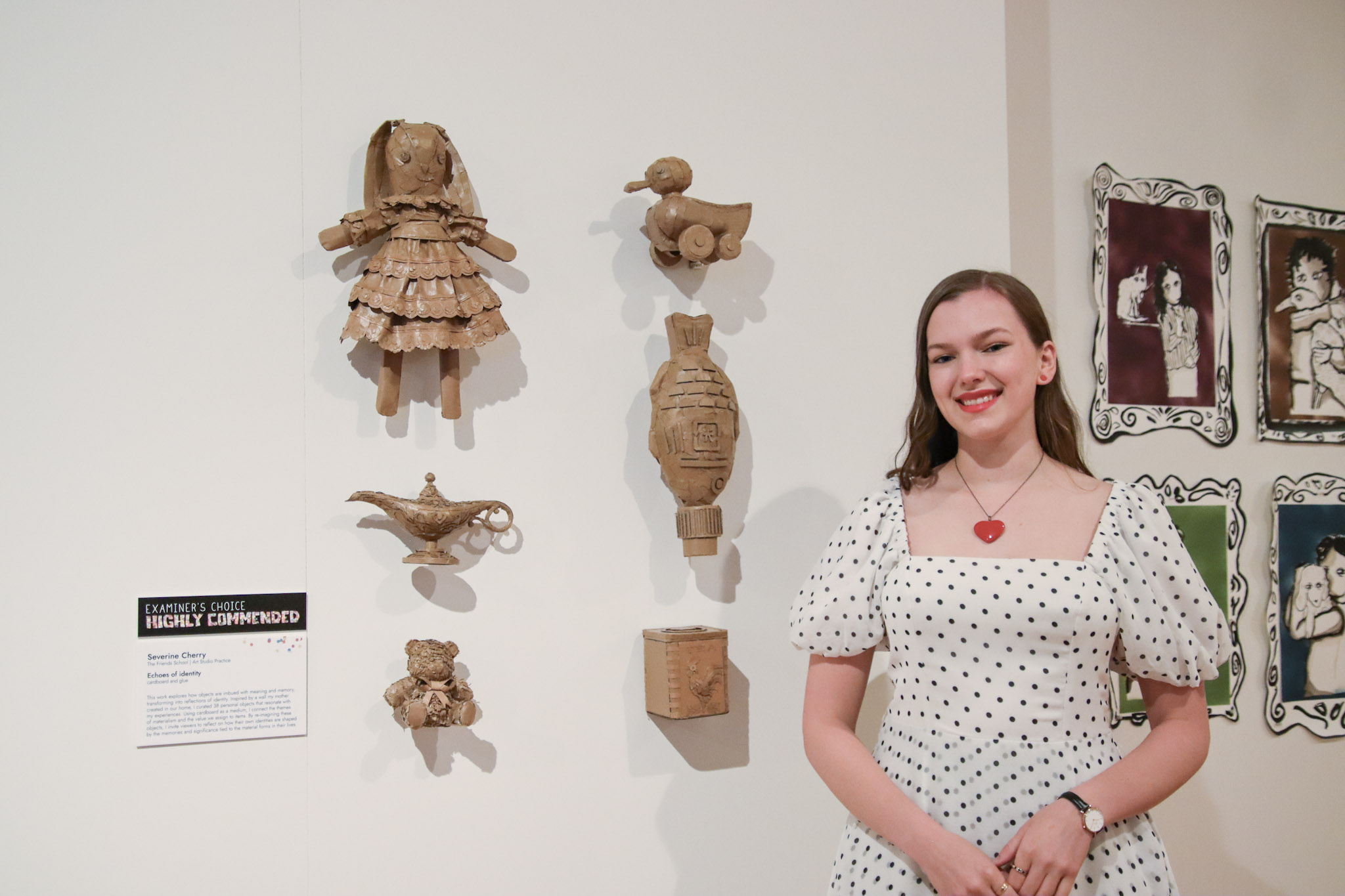 2024 ArtRage Medallion winner Severine Cherry, with her work Echoes of Identity.