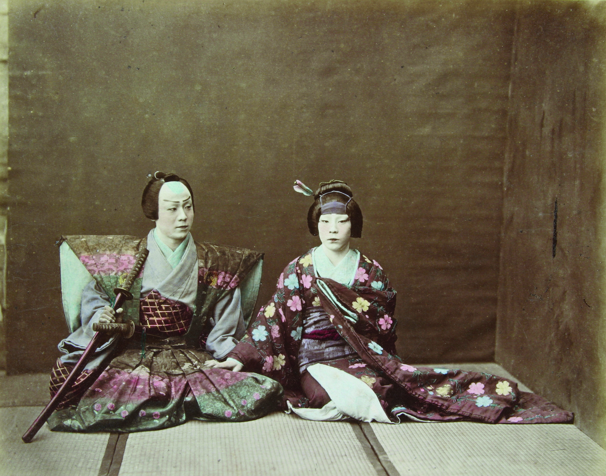 Felice BEATO, Senior Official with his Wife about 1870, albumen silver photograph, hand tinted, Gift of Charles Smith, 2004. QVM:2004:P:0025
