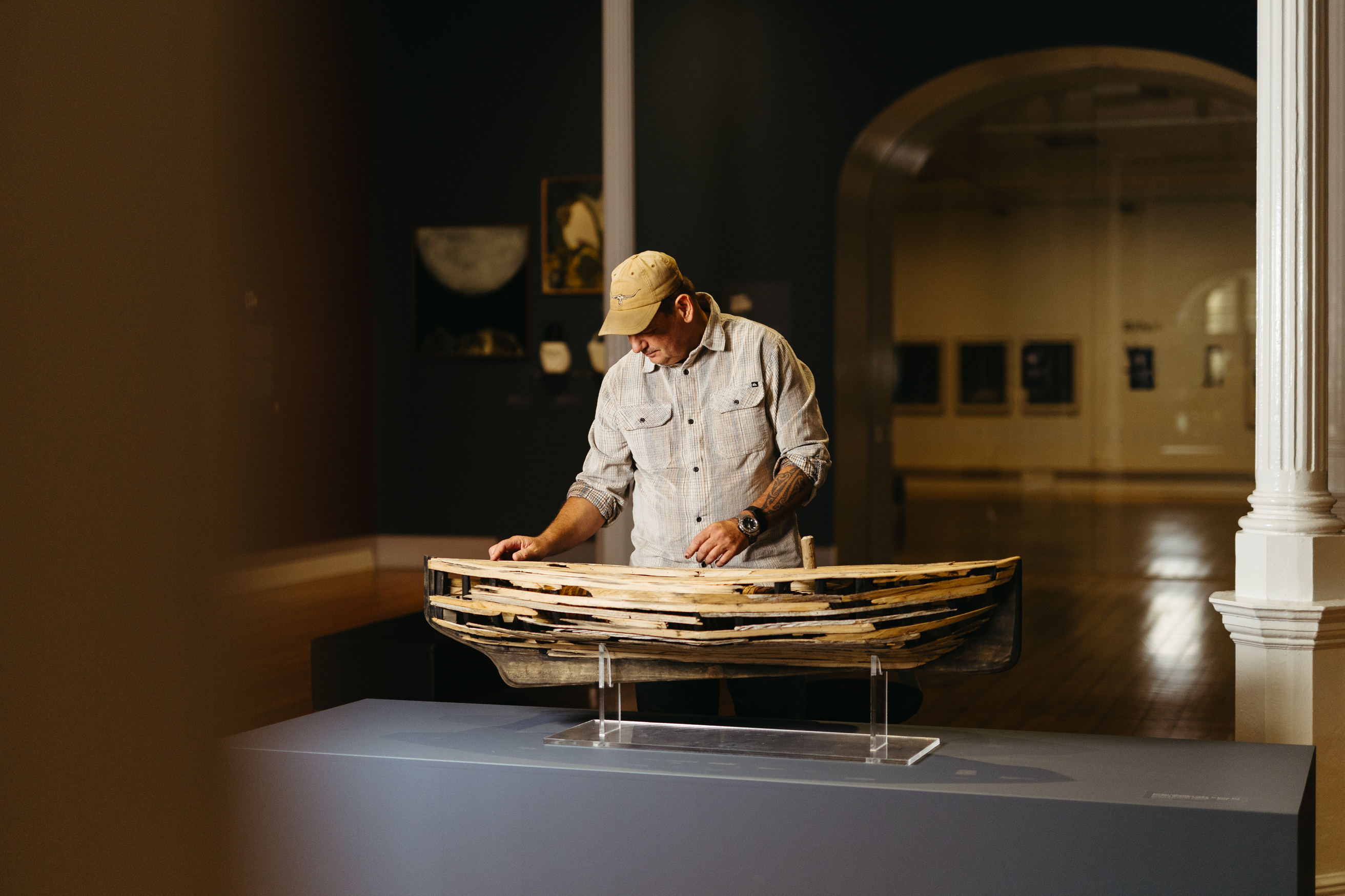 Dean Greeno inspects his artwork in RISE
