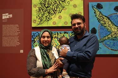 Artist Halima Bhatti and her family in the RISE exhibition