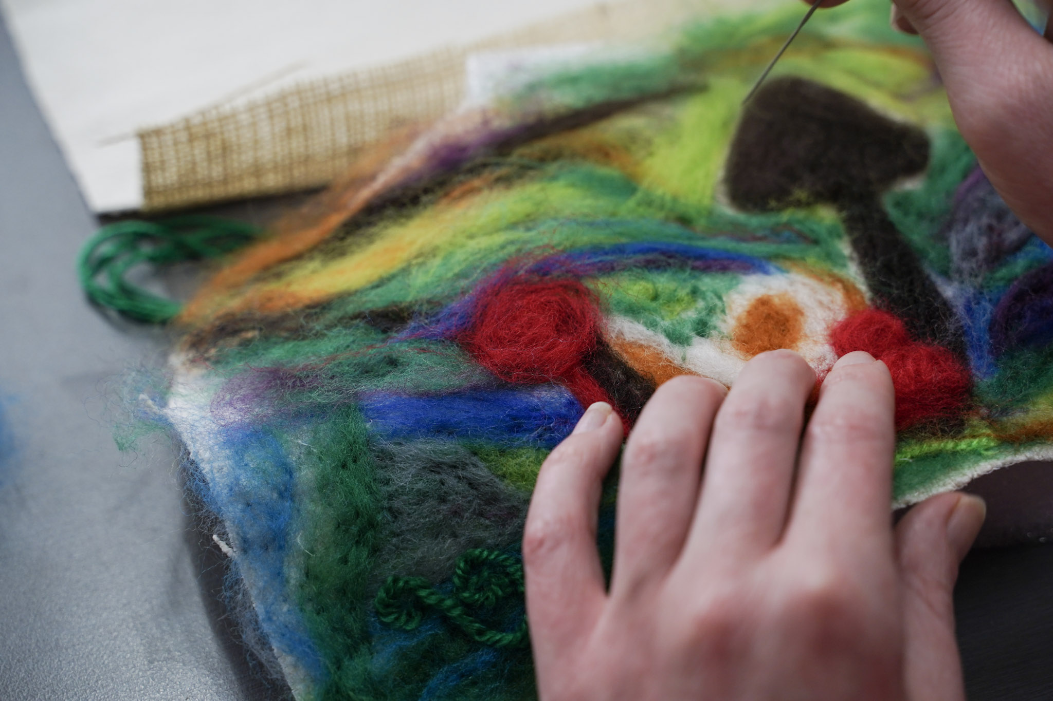 Needle felted landscape artwork created in an Arts on Site workshop.