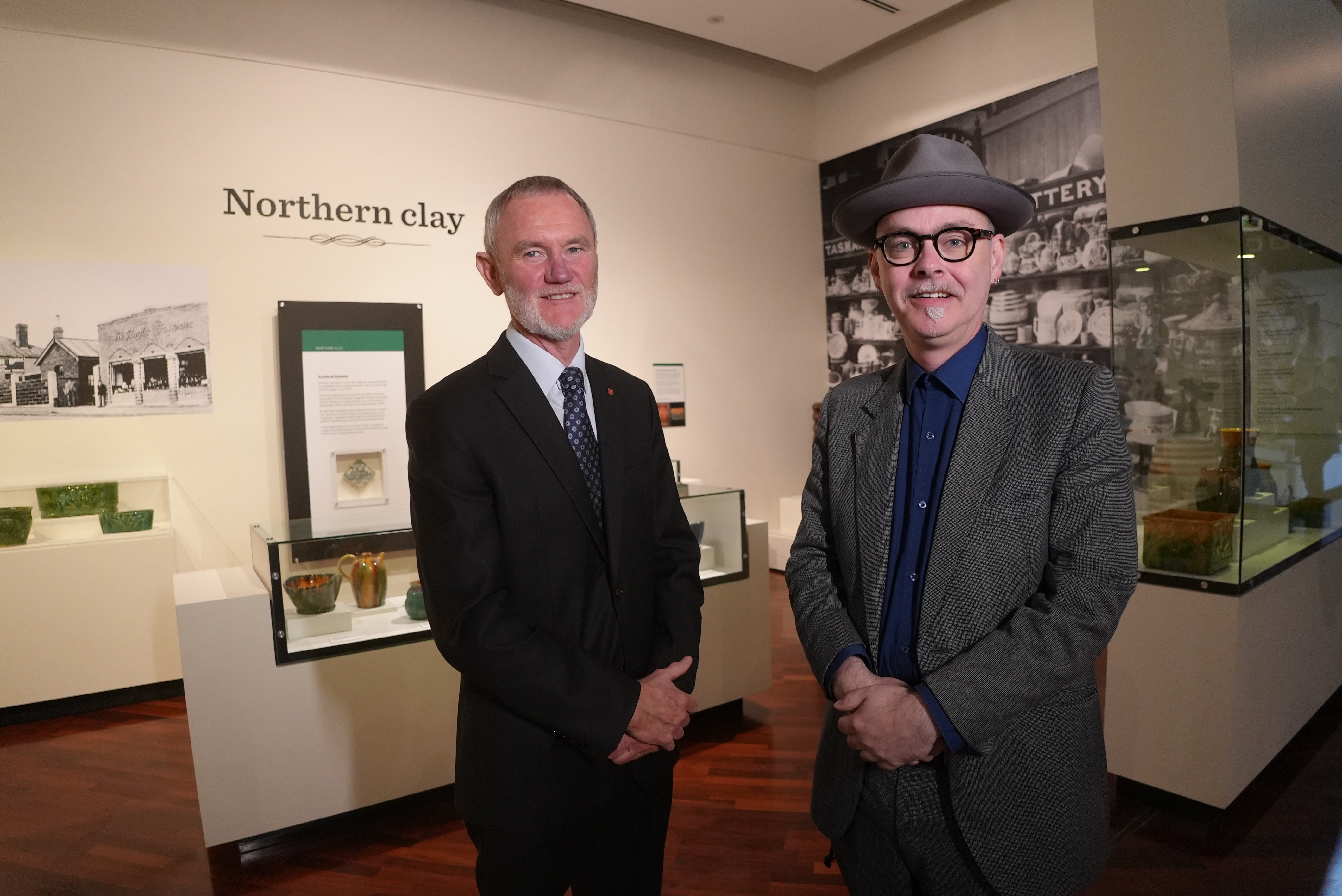 City of Launceston Mayor Albert van Zetten and Senior Curator of Art and Design Ashley Bird, standing in the new exhibition module space called Northern Clay.