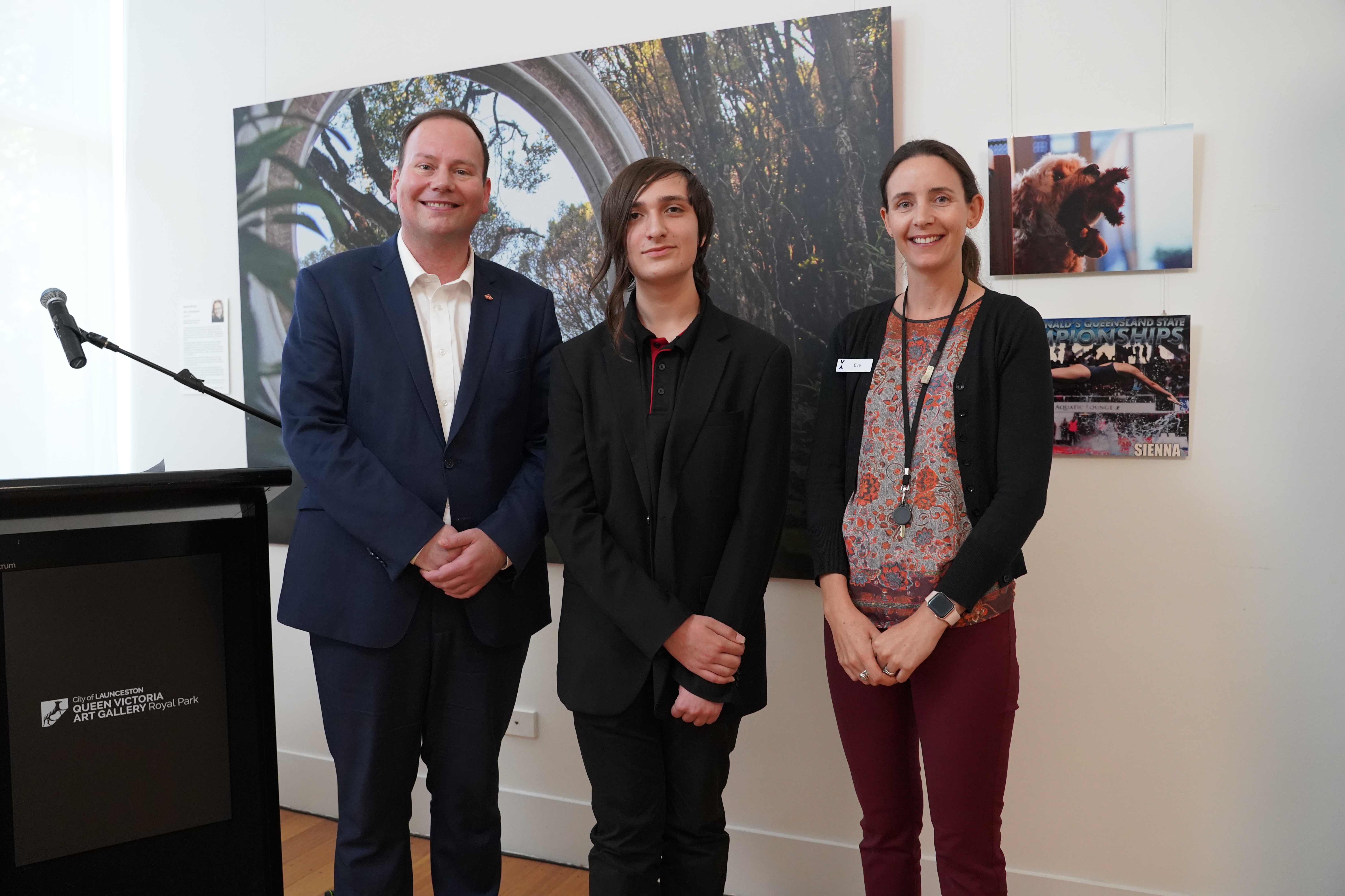 The Big Picture exhibition opening. City of Launceston Mayor Danny Gibson, student curator Armon Caster and QVMAG Educatuon Officer Evelyn Williams.png